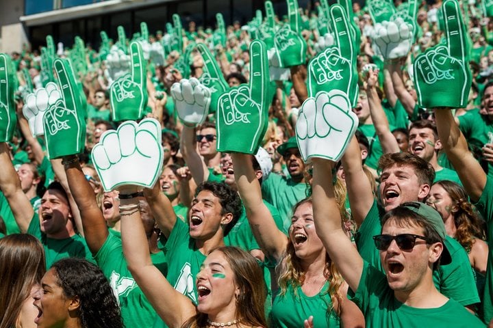 Screen-printed college foam fingers in a university student section